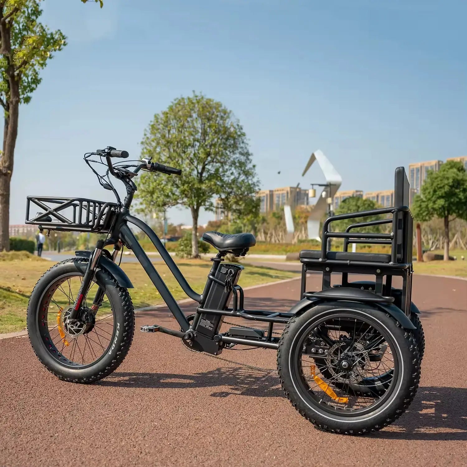 Two-person electric tricycle with fat tires for stable and eco-friendly transportation